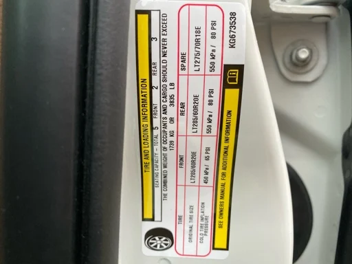 Ram truck payload sticker on driver-side door jamb